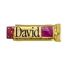 David Red Velvet flavored protein bar packaging on a black background