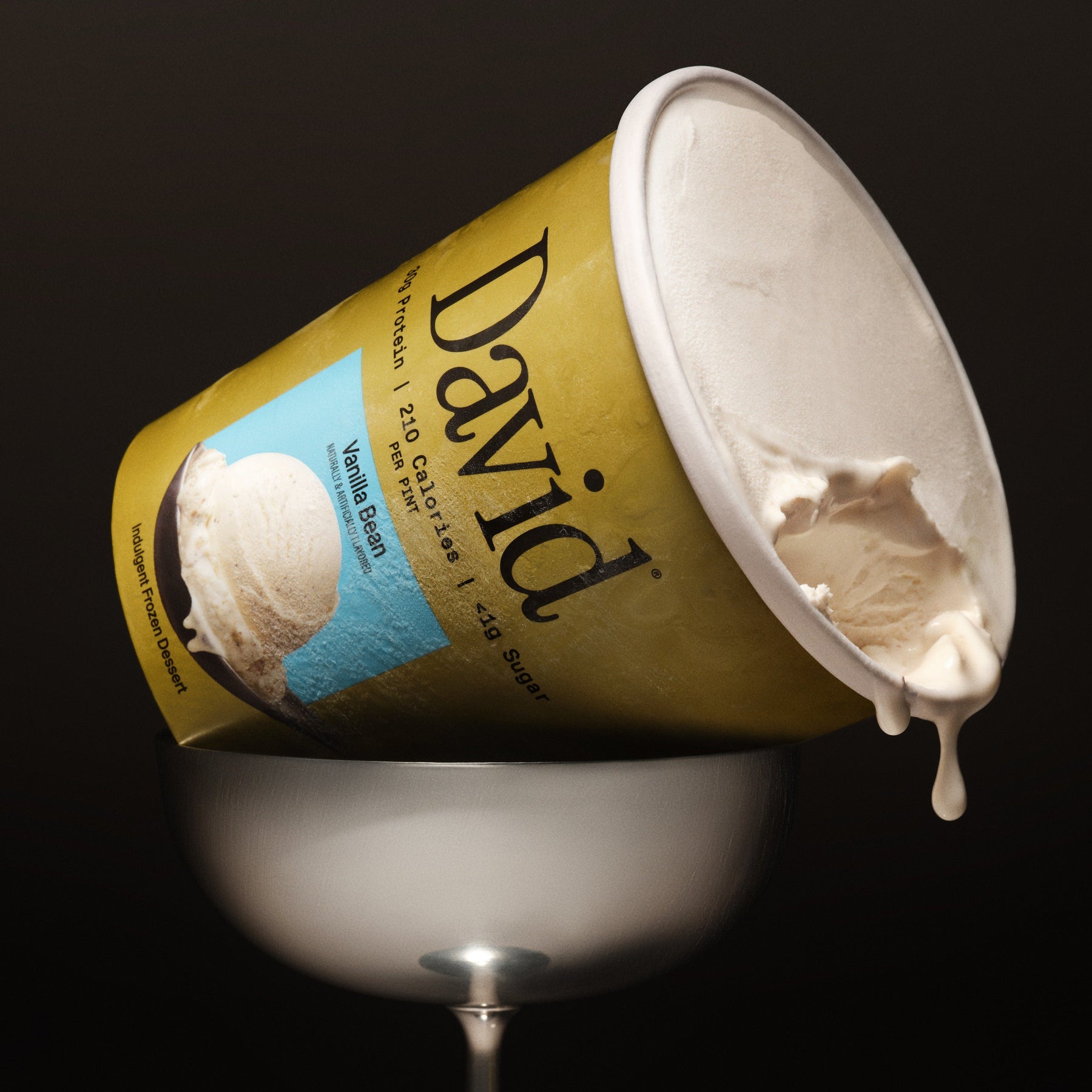 Ice cream container labeled 'David' with a scoop of ice cream on a black background