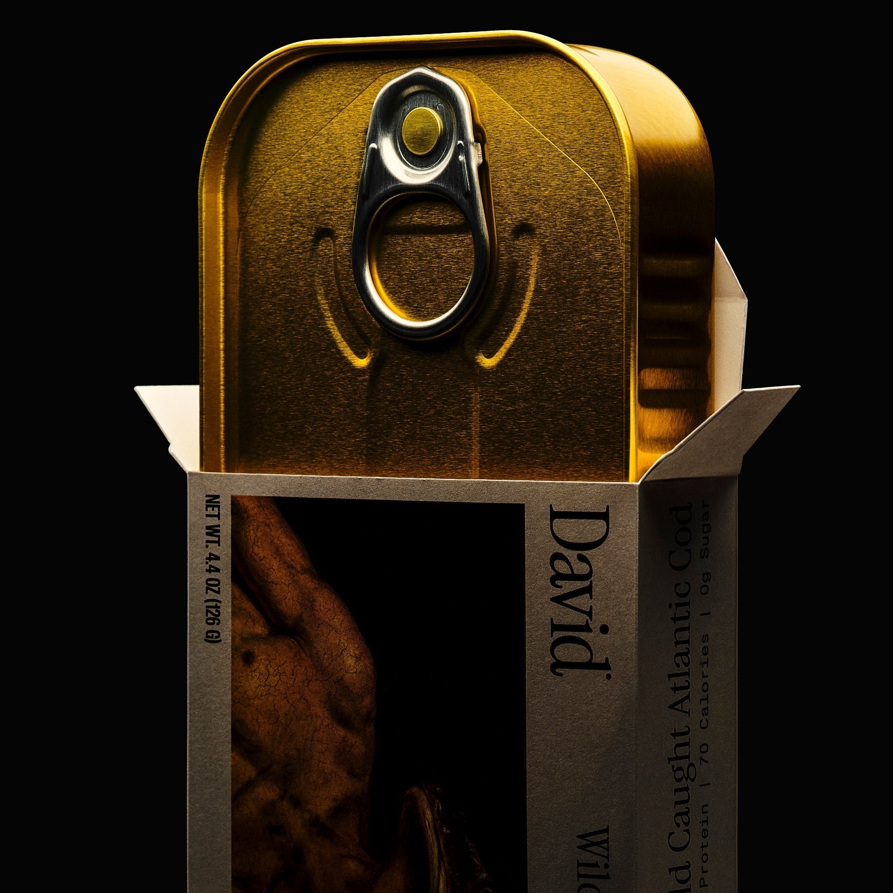 Gold canned fish with 'David' branding coming out of a box
