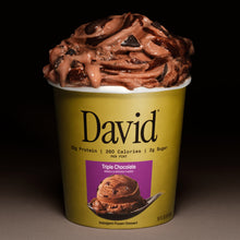 Gold container of David Triple Chocolate frozen dessert on a dark background